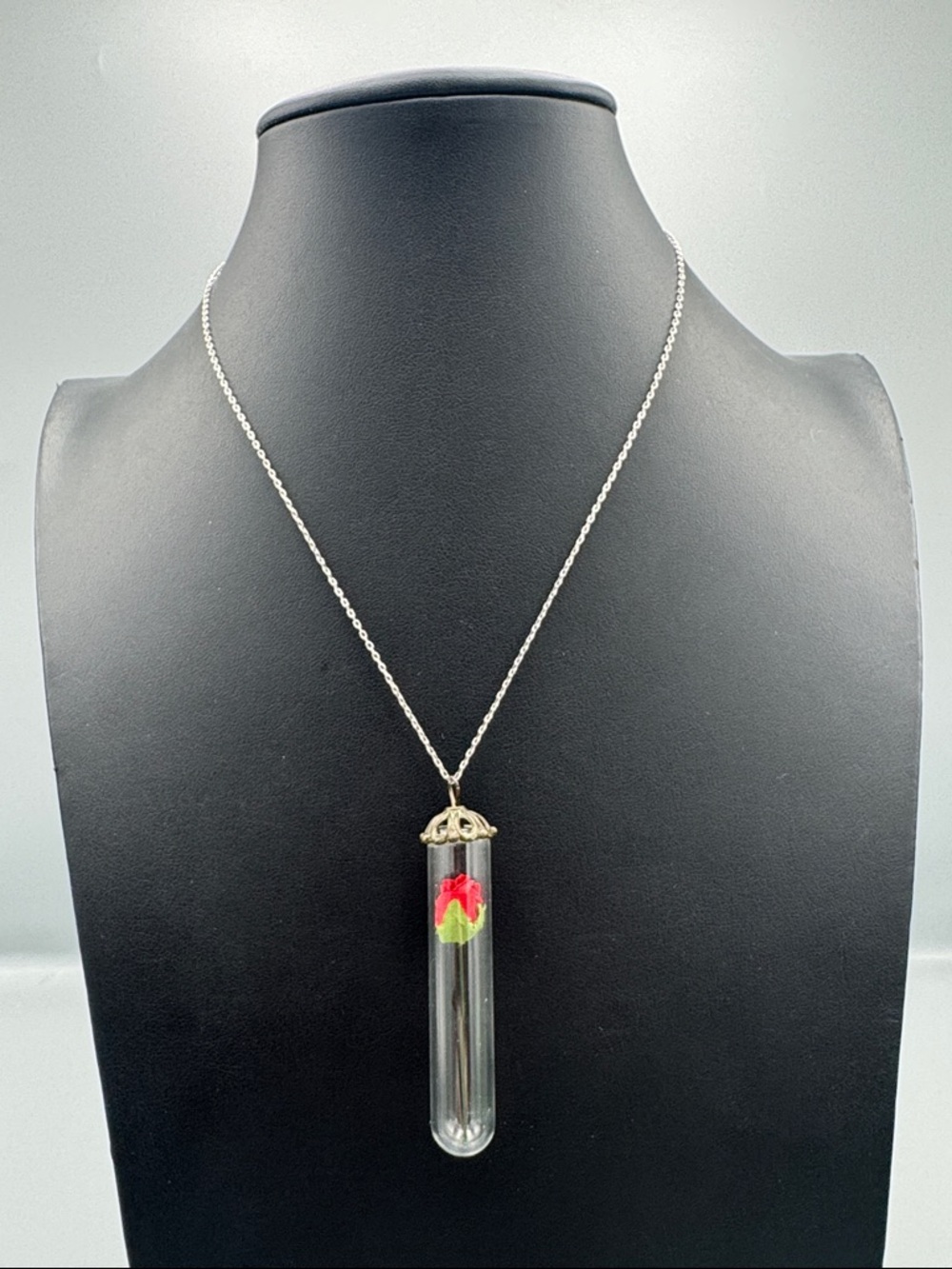 Sterling Silver Vial Necklace with Red and Green Flower Pendant